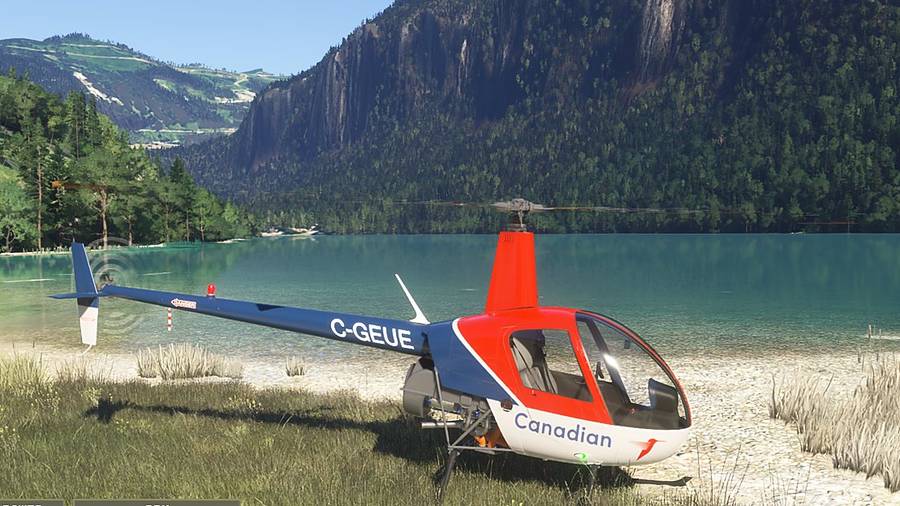 Robinson R22 posé au bord d’un lac, entre les roseaux, sur le simulateur de vol hélicoptère HélicoSimu