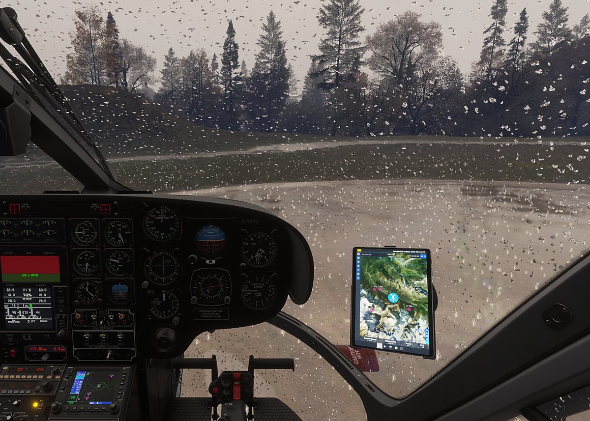 Gouttes de pluie sur la bulle d’un hélicoptère, vue depuis le poste de pilotage, sur le simulateur de vol hélicoptère HélicoSimu
